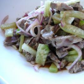 Chicken gizzard salad with pickled cucumbers